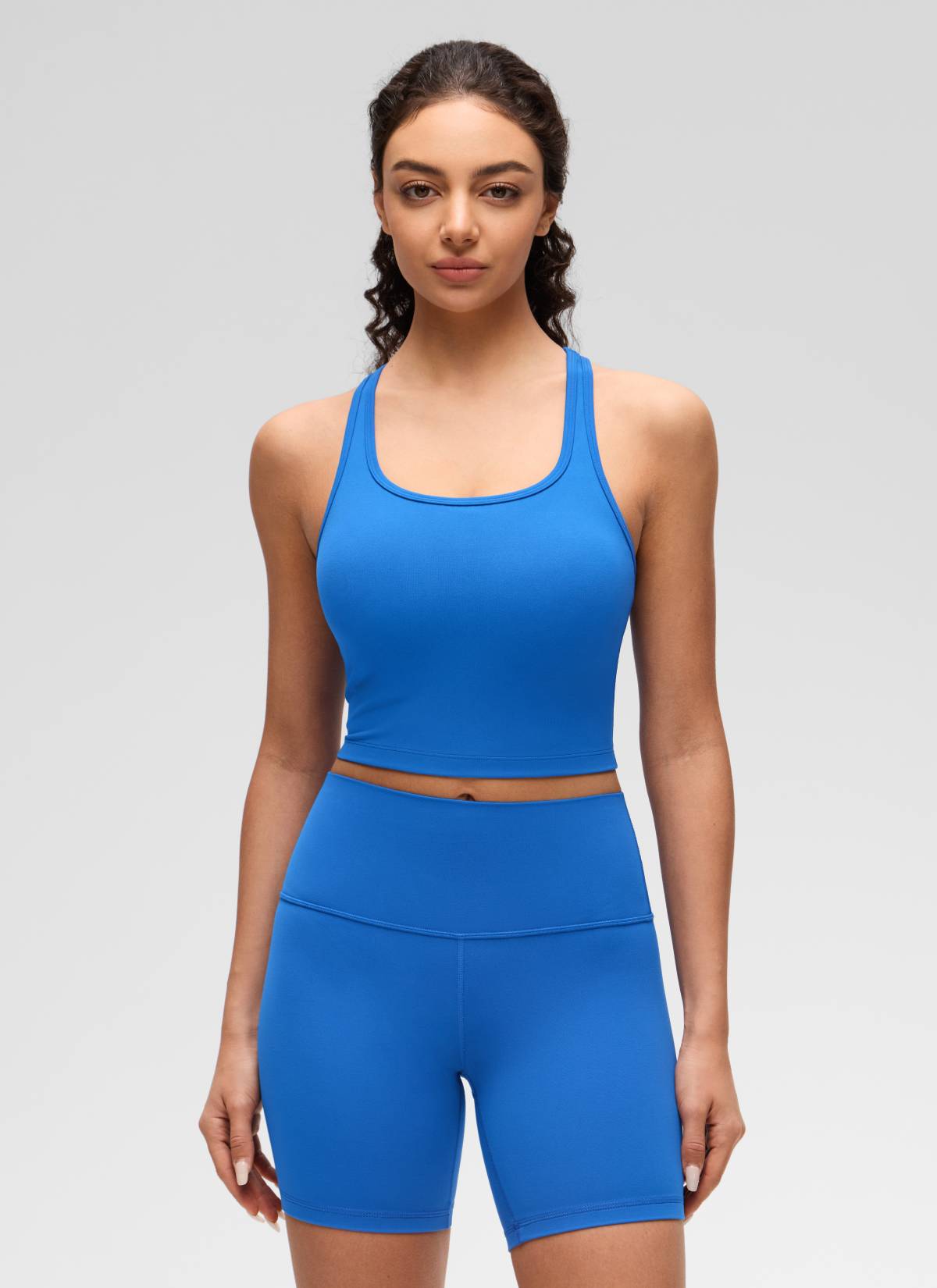 CRZ YOGA Bra Yoga Wanita dengan Dukungan Rendah, Model " Butterluxe ", Leher Bulat, Punggung Berbentuk Y, Warna Biru Berkilau