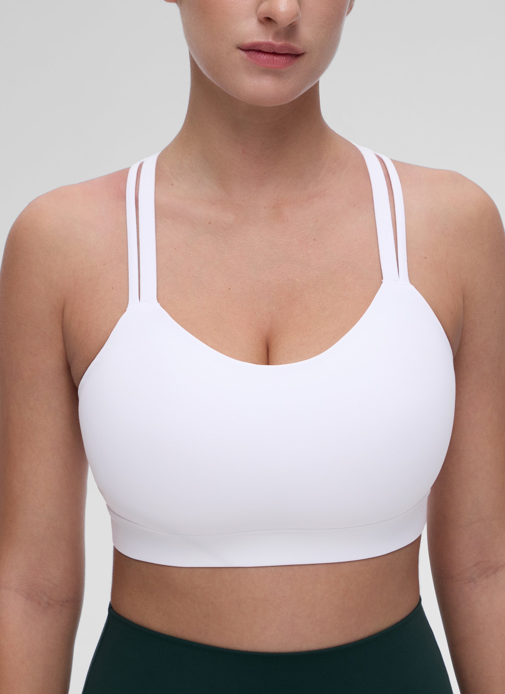 CRZ YOGA Bra Olahraga Wanita dengan Dukungan Ringan, Tali Ganda, dan Desain Berbentuk, Warna Putih
