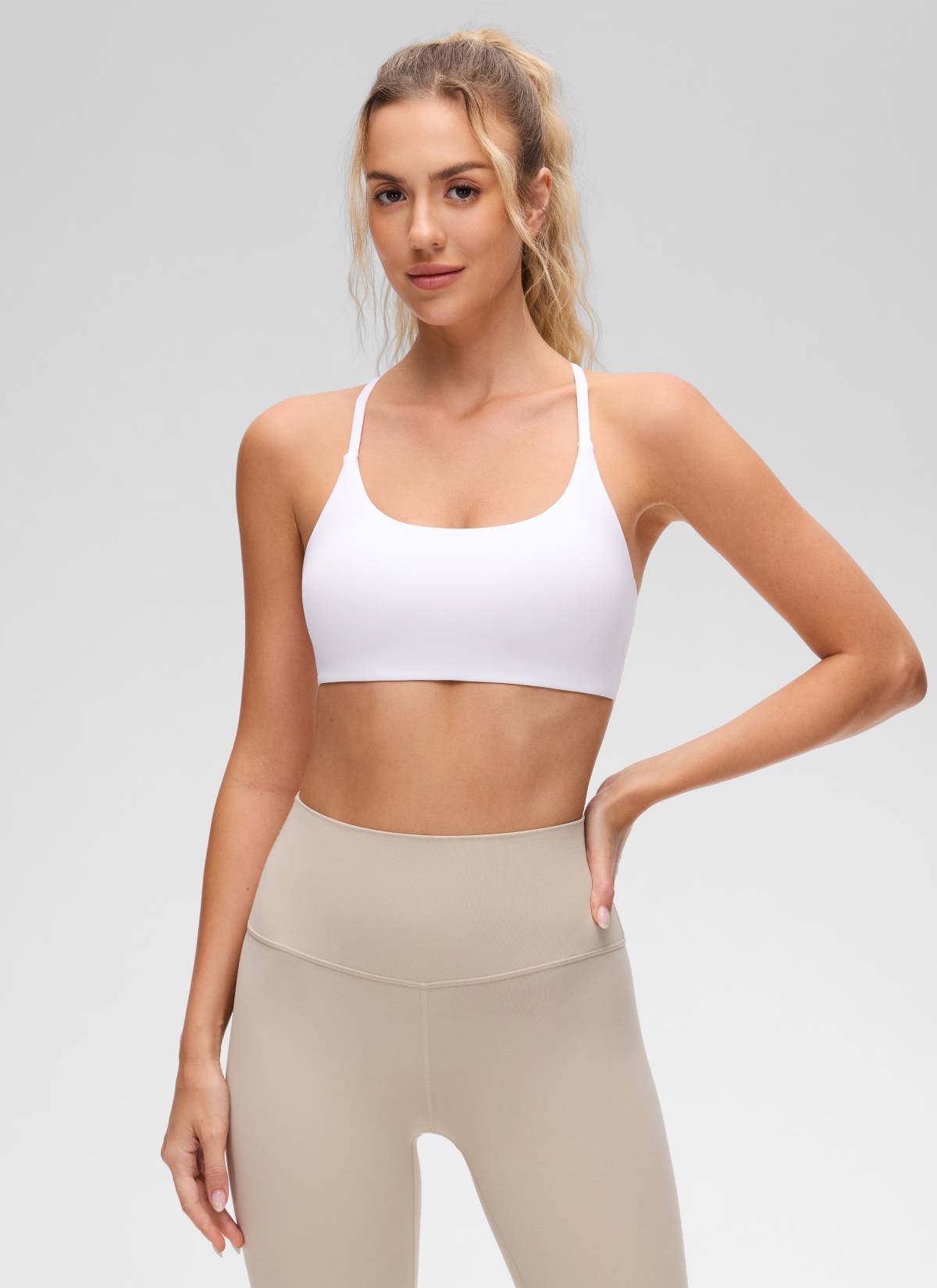 CRZ YOGA Bra Olahraga Wanita dengan Leher Bulat, Desain Twist, dan Punggung Silang untuk Yoga " Butterluxe " Warna Putih