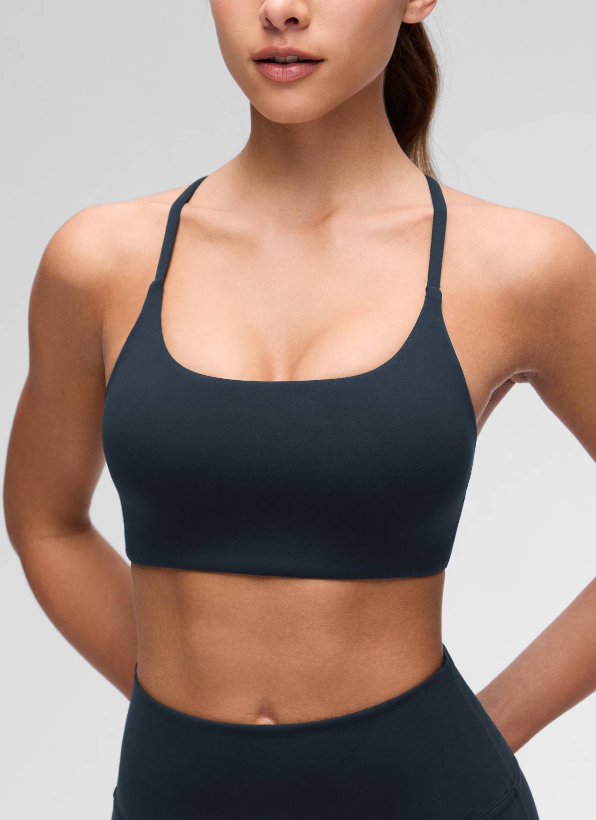 CRZ YOGA Bra Olahraga Wanita dengan Leher Bulat, Desain Twist, dan Punggung Silang untuk Yoga " Butterluxe " Warna True Navy