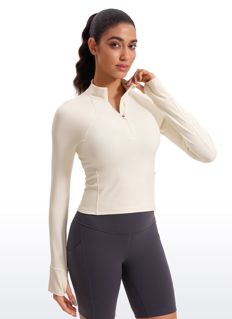 CRZ YOGA Atasan Yoga Wanita Model Slim Fit dengan Aksen " Butterluxe ", Lengan Panjang, Ritsleting Setengah, Warna Putih dan Aprikot