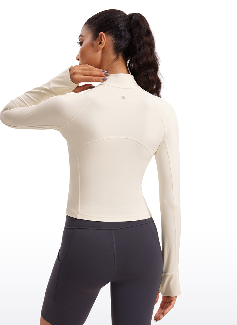 CRZ YOGA Atasan Yoga Wanita Model Slim Fit dengan Aksen " Butterluxe ", Lengan Panjang, Ritsleting Setengah, Warna Putih dan Aprikot